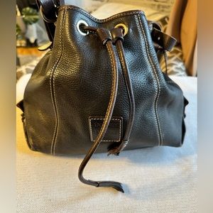 Dooney & Bourke leather brown bucket bag. Pre-loved